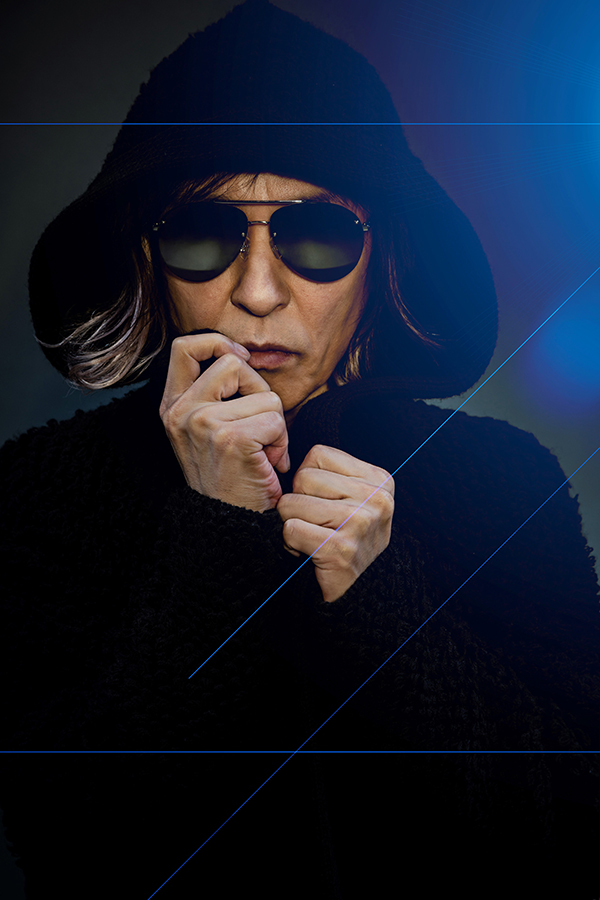 帽子とサングラスを着けた宇都宮隆の写真